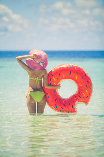 istock Enjoying in sun at shallow water, Maldives 692051782