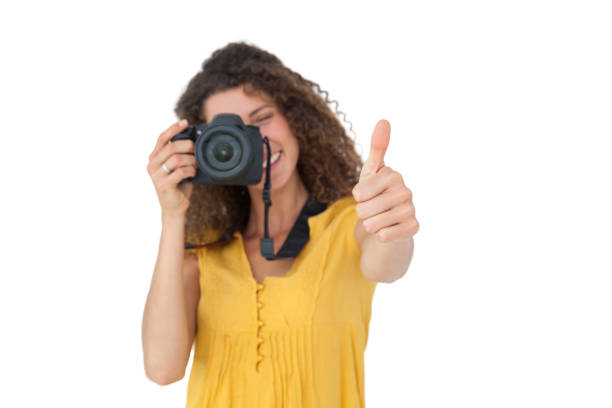 istock Female photographer gesturing thumbs up 692053154