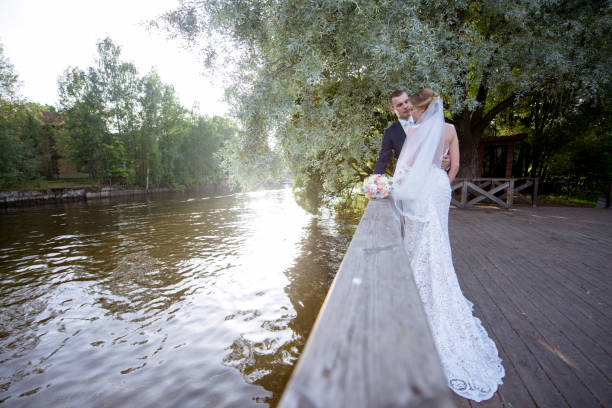 istock Wedding couple on the nature is hugging each other 692056410