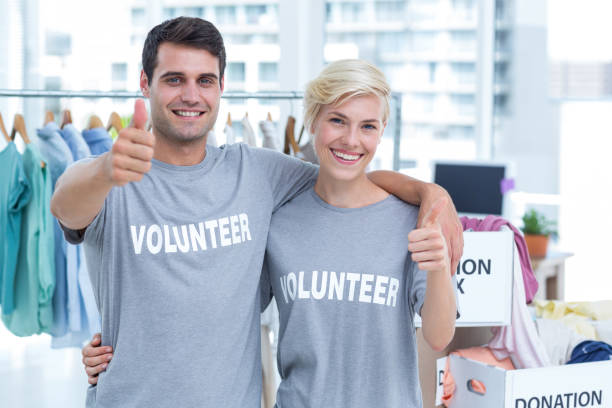 istock Happy couple of volunteer 692059006