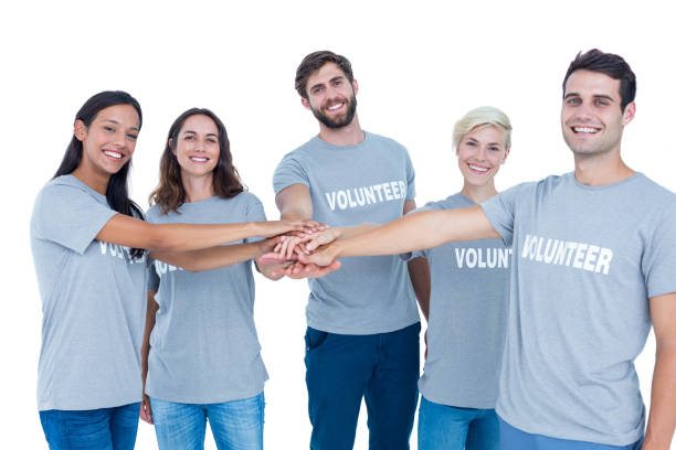 istock Volunteers friends putting their hands together 692061324