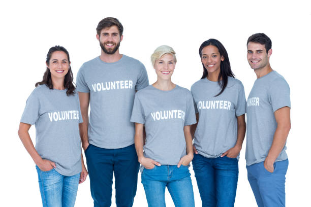 istock Volunteers friends smiling at the camera 692064932