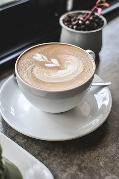 istock Close-Up Of Cappuccino On Table 692064939