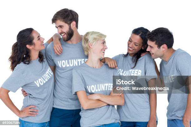 Volunteers Talking Together Stock Photo - Download Image Now - Standing, Two People, White Background
