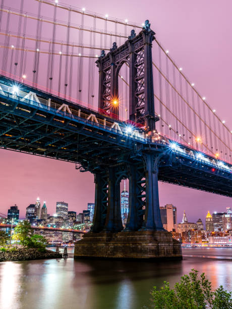 istock Manhattan bridge framing the World Trade Center at night 692067982