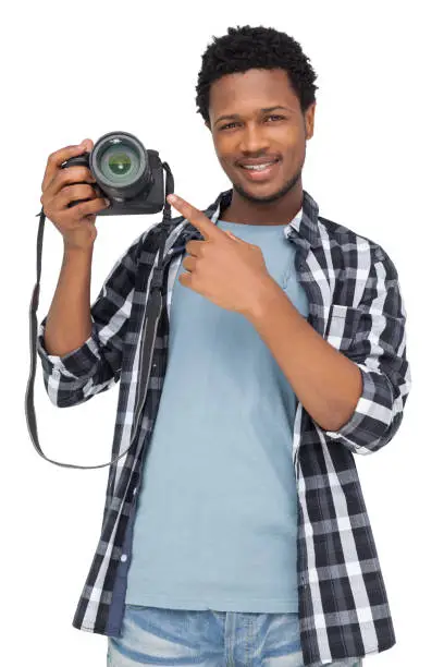 Photo of Portrait of a happy man pointing at his camera