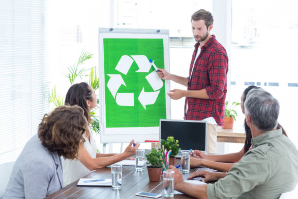 istock Young creative team having a meeting about recycling 692084664
