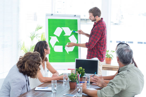 istock Young creative team having a meeting about recycling 692084718