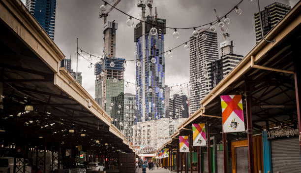 This photo was taken out and about in Melbourne in October last year in a little laneway in the Queen Victoria Market. This image includes a a look up from the laneway looking at the many building's being construction in Melbourne.