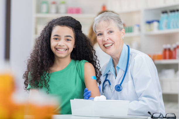 istock Cheerful senior doctor with patient 692088072