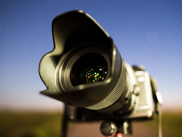 istock Professional camera under the light of the moon at night 692099620