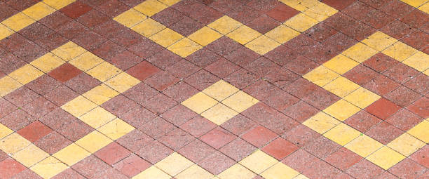 istock Paving stone on the road as a background 692113538