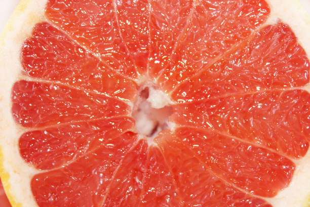 istock cut of ripe grapefruit 692125586