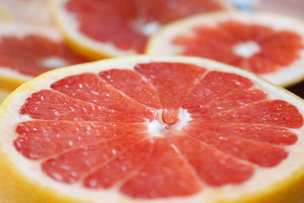 istock cut of ripe grapefruit 692126220