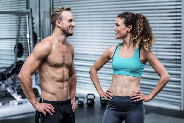 istock A muscular couple discussing together 692126612