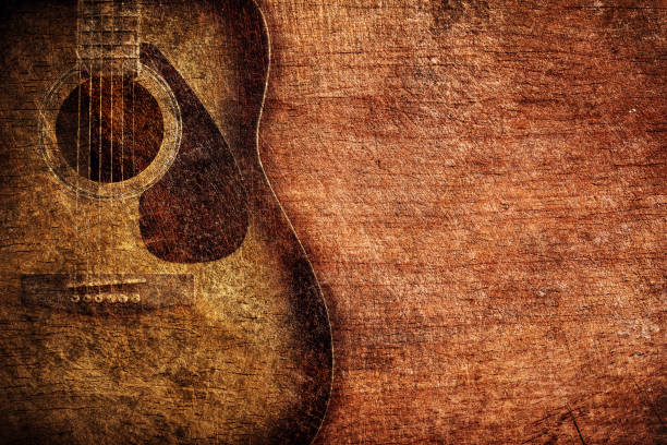 istock Guitar on wooden background vintage 692129010