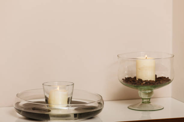istock Decorative candles in bowls with coffee seeds 692131370