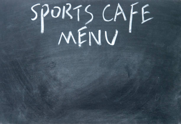 istock sports cafe menu title written with chalk on blackboard 692131936