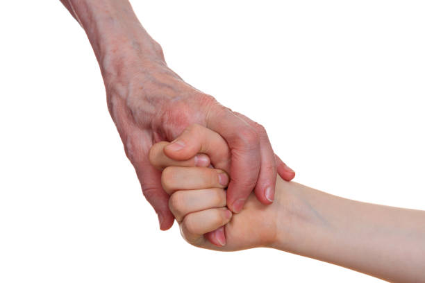 Old and young holding hands of each other