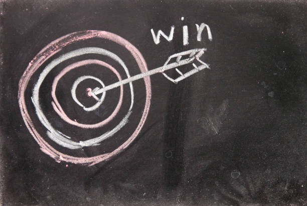istock The arrow of win hit the target 692136438