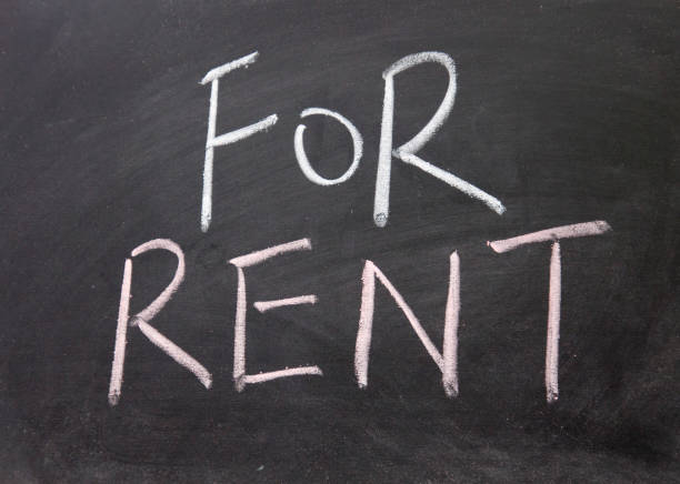 istock for rent title written with chalk on blackboard 692136448