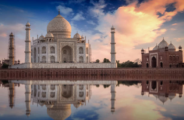 istock Taj Mahal Agra at sunset with vibrant sky. A Mughal Indian architectural masterpiece built on the banks of the Yamuna river. 692141838
