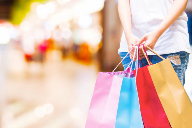 istock Women holding shopping bags 692147110