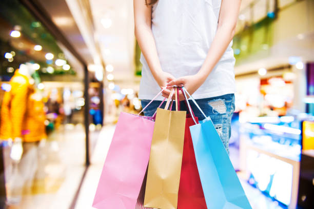 istock Women holding shopping bags 692147232