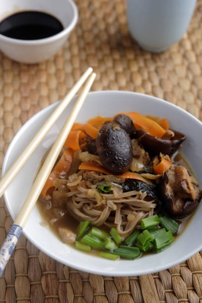 istock Shiitake, soba, and tofu soup 692154106