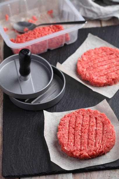 istock Cooking hamburgers 692154188