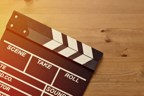 istock movie clapper on wood table 692172178