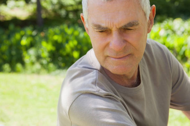 istock Thoughtful mature man at park 692175658