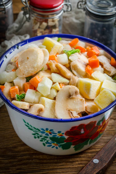 istock Frozen vegetables in a metal bowl. 692178494