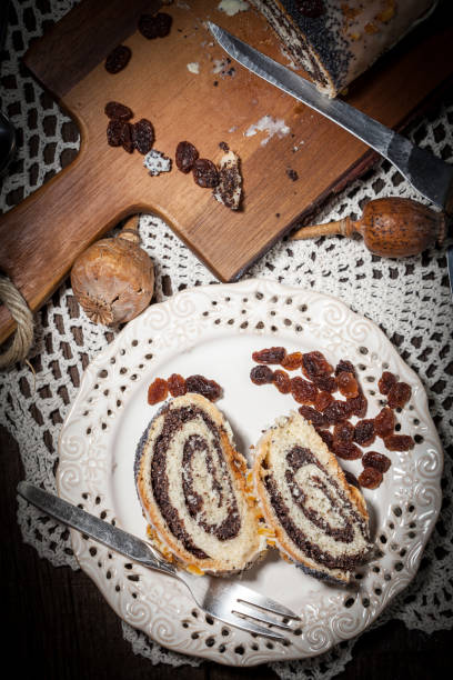 istock Pieces of poppy seed cake on a plate. 692179928