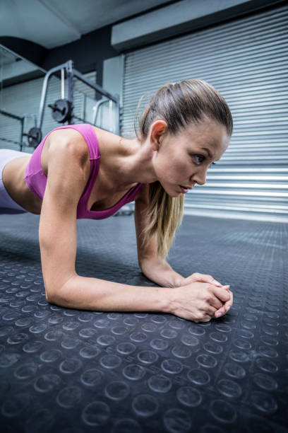 istock A muscular woman on a plank position 692196800