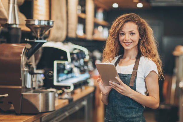 istock Barista holding a digital tablet 692200226
