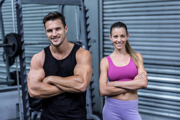 istock Muscular couple looking at the camera 692201316