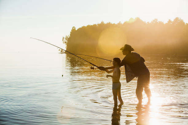 580+ Kids Fishing Silhouette In Sunset Stock Photos, Pictures