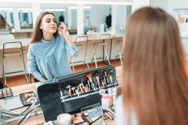 istock Woman work with own face in beauty studio 692224930