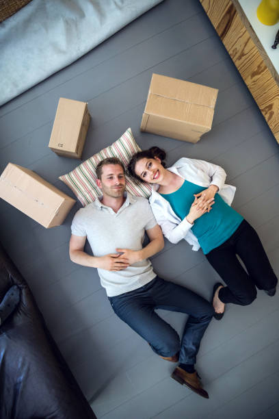 istock Young couple Moving Into a New House 692227728