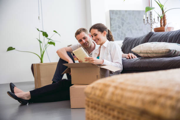 istock Young couple Moving Into a New House 692227766