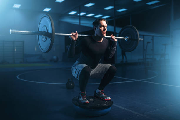 istock Strength athlete on training, workout with barbell 692227786