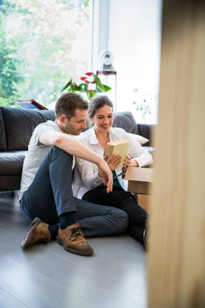 istock Young couple Moving Into a New House 692227800