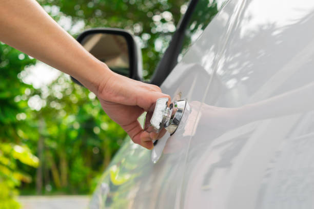 istock Hand is opening car door 692234560