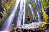 Man admiring Gljúfrafoss waterfall