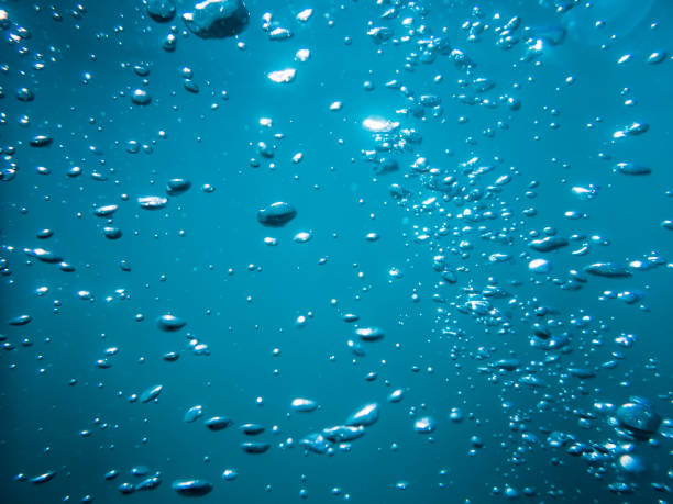 istock Bubbles in tropical sea. Underwater texture in ocean 692253370
