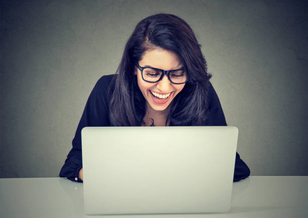 istock Happy smiling woman working with laptop 692253456