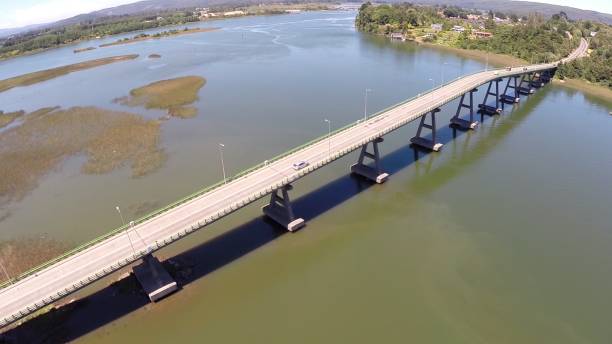 istock Aerial view of a river and bridge in Chile 692257336