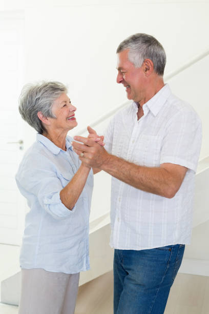 istock Happy senior couple dancing together 692260692