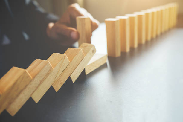 istock Concept of solution and domino effect.Slightly de-focused and close-up shot. Selective focus. 692261100